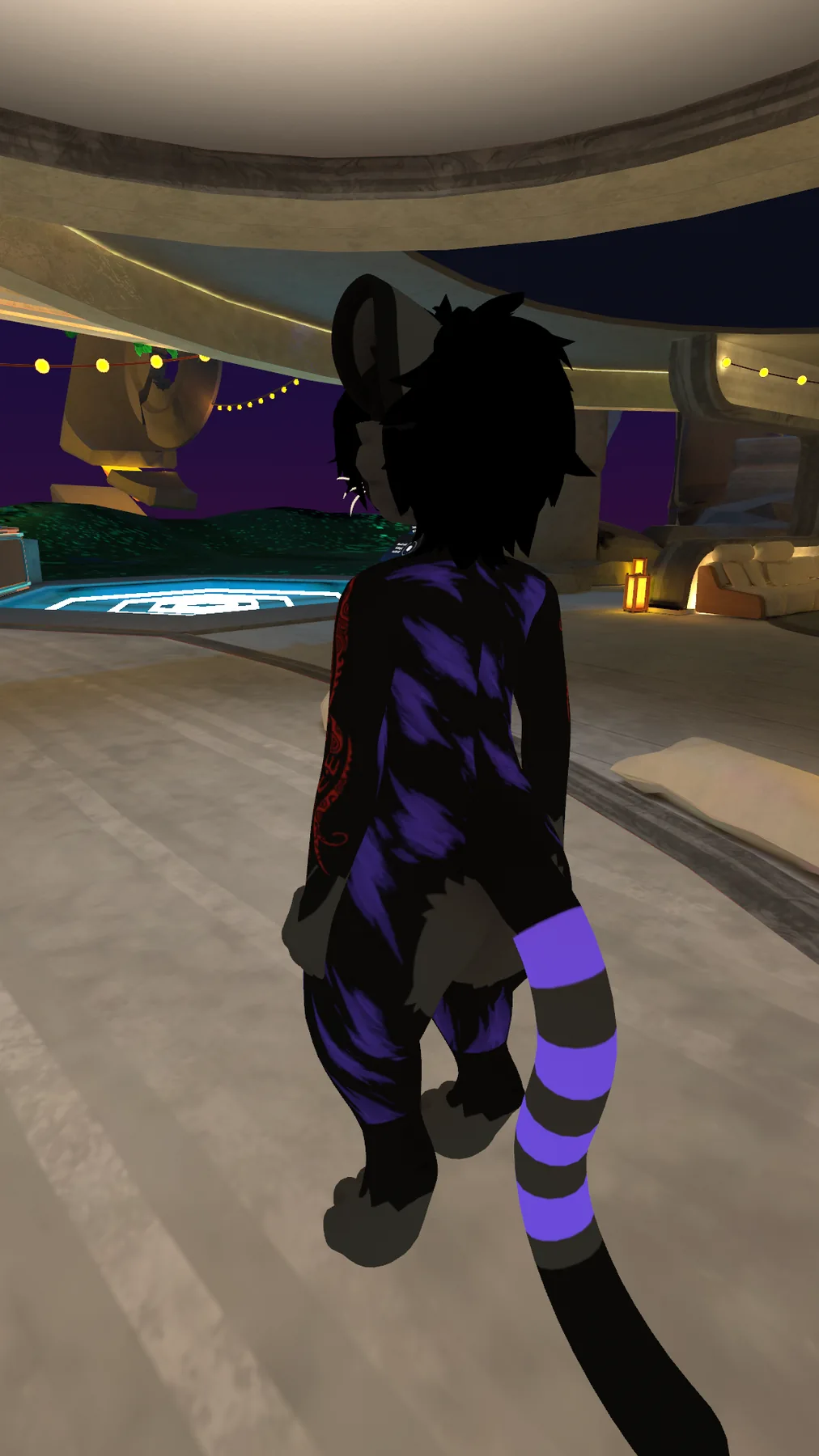 Nightmare Fang rear view showing purple markings and striped tail